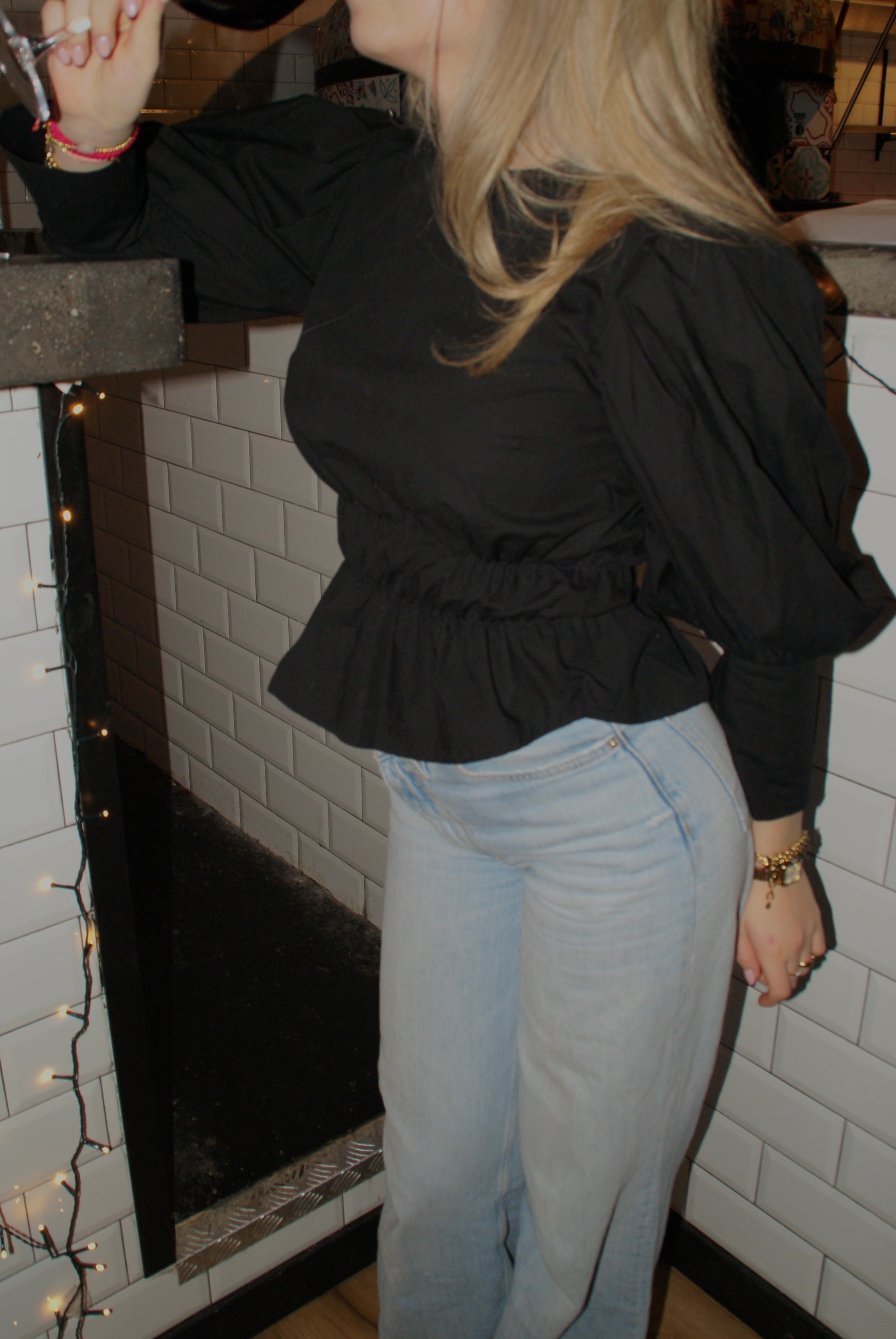 Zwarte blouse elastiek