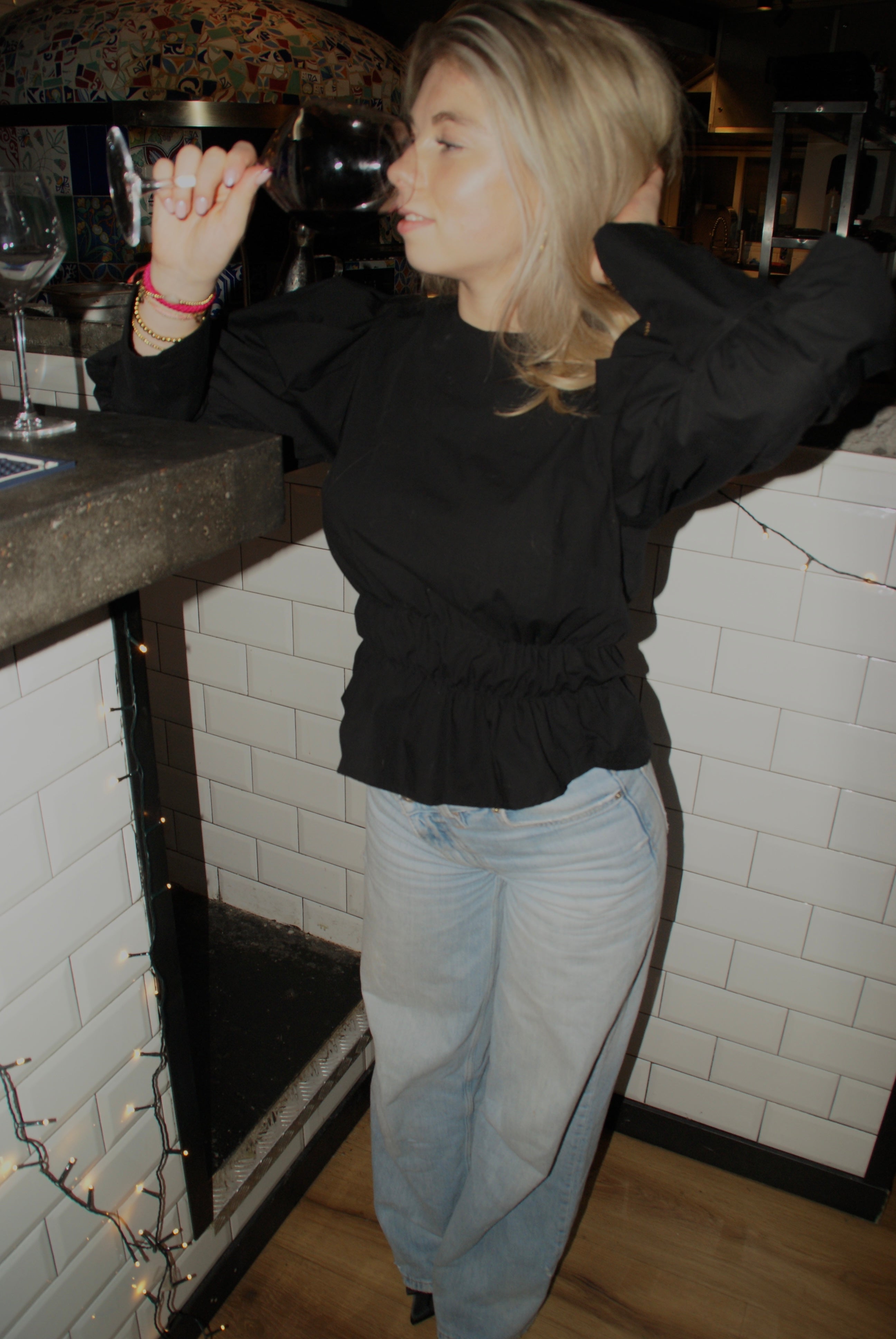 Zwarte blouse elastiek