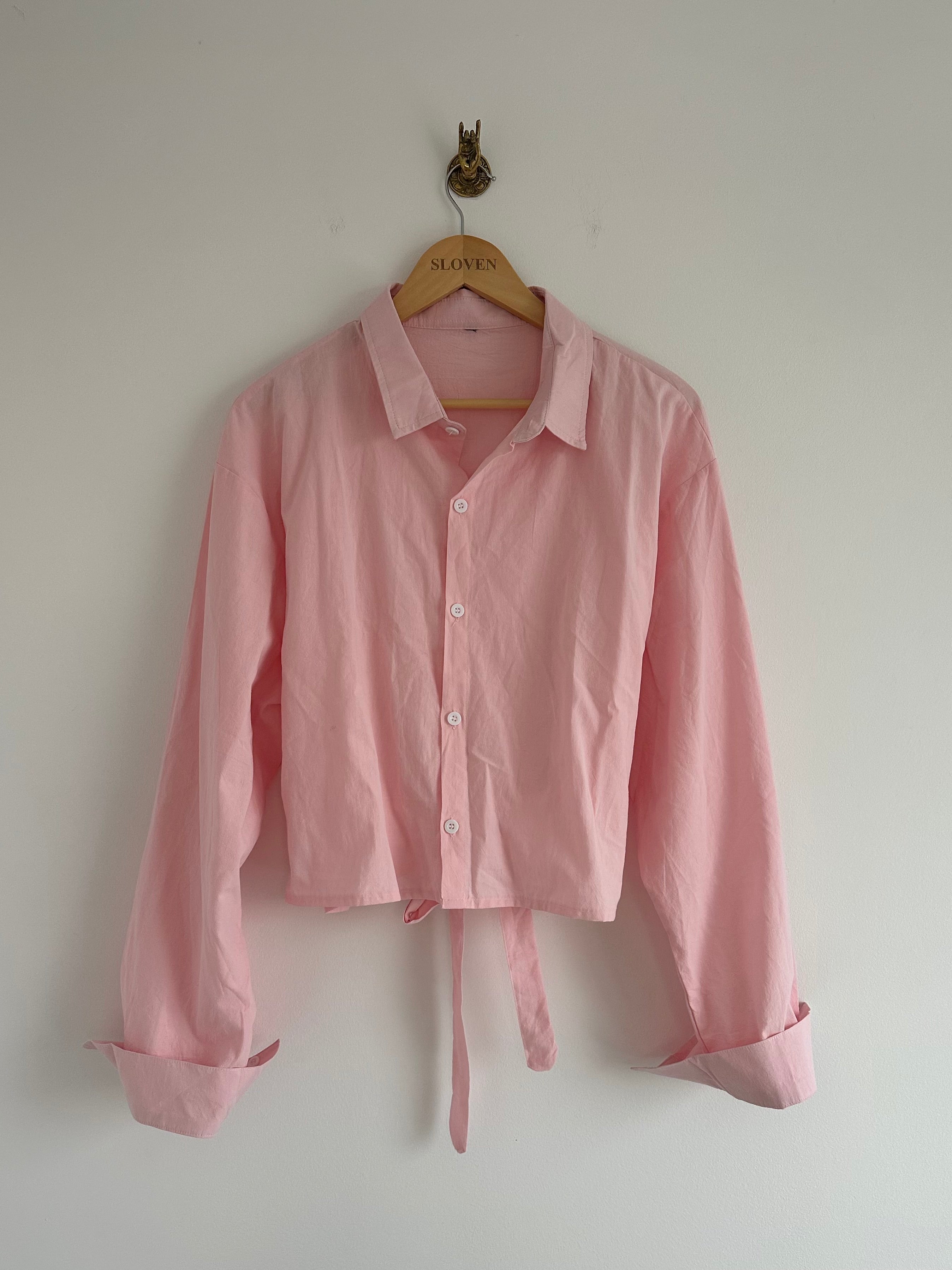 Roze blouse ceintuur