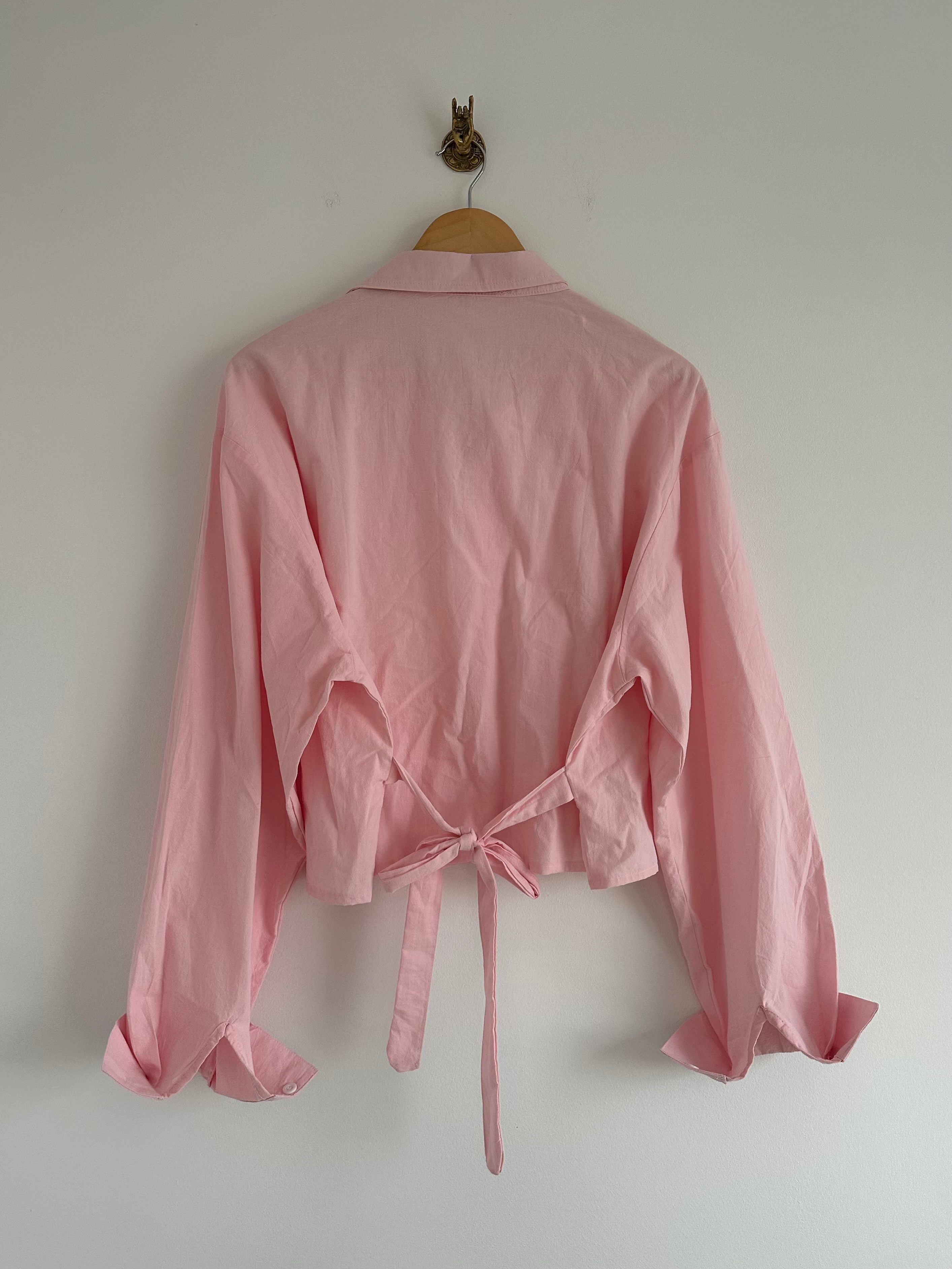 Roze blouse ceintuur