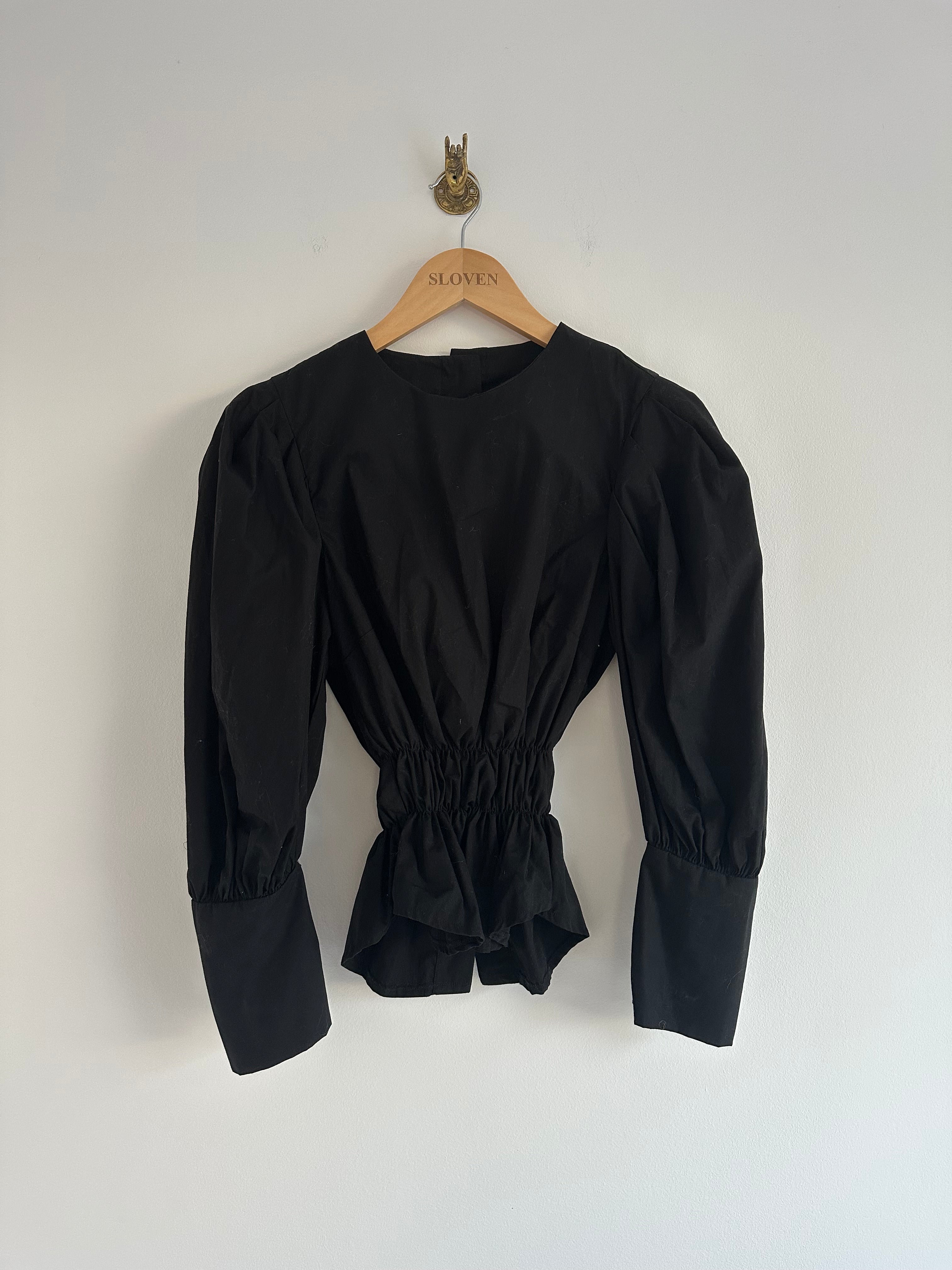 Zwarte blouse elastiek