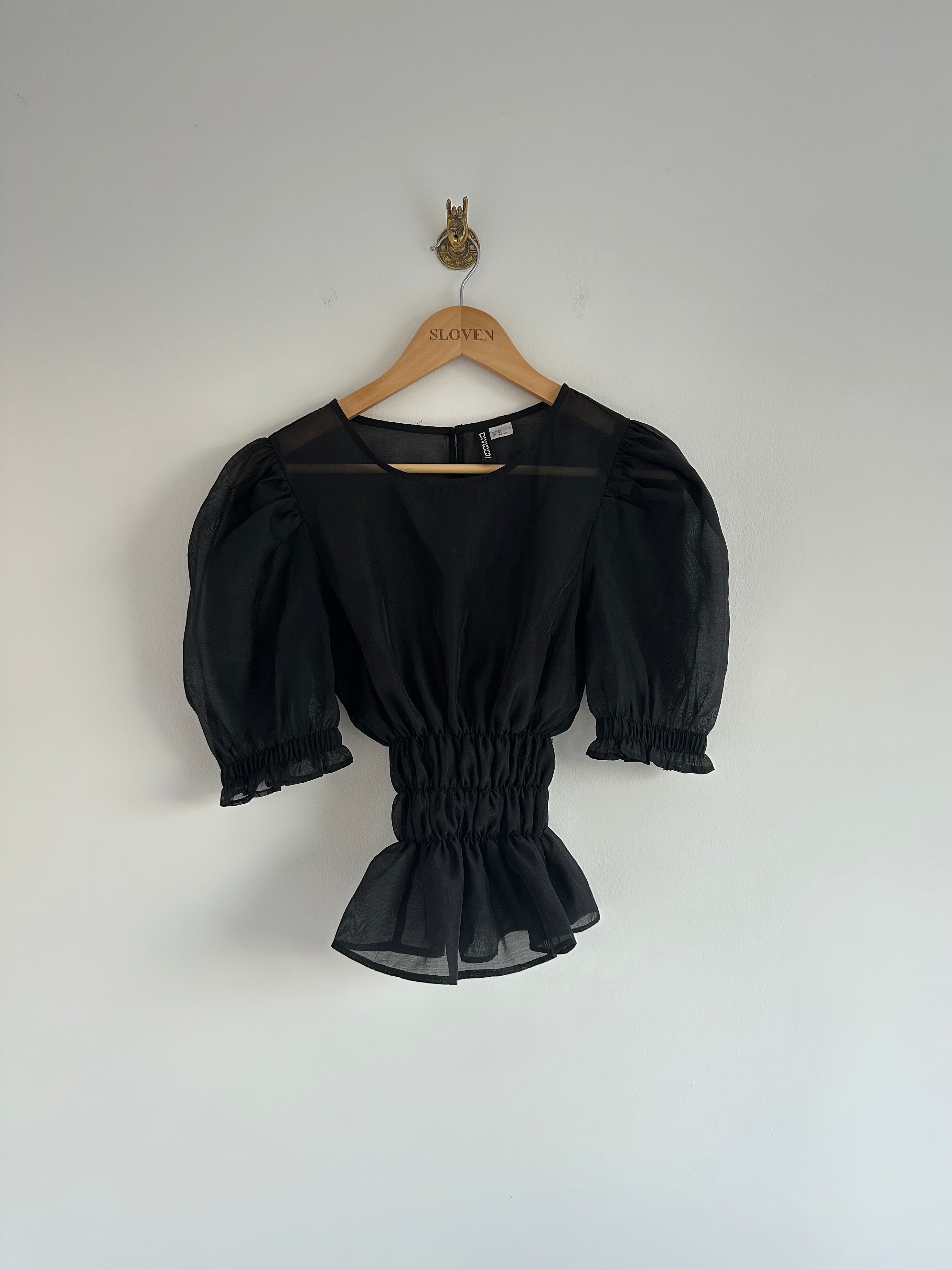 Doorzichtige top elastiek