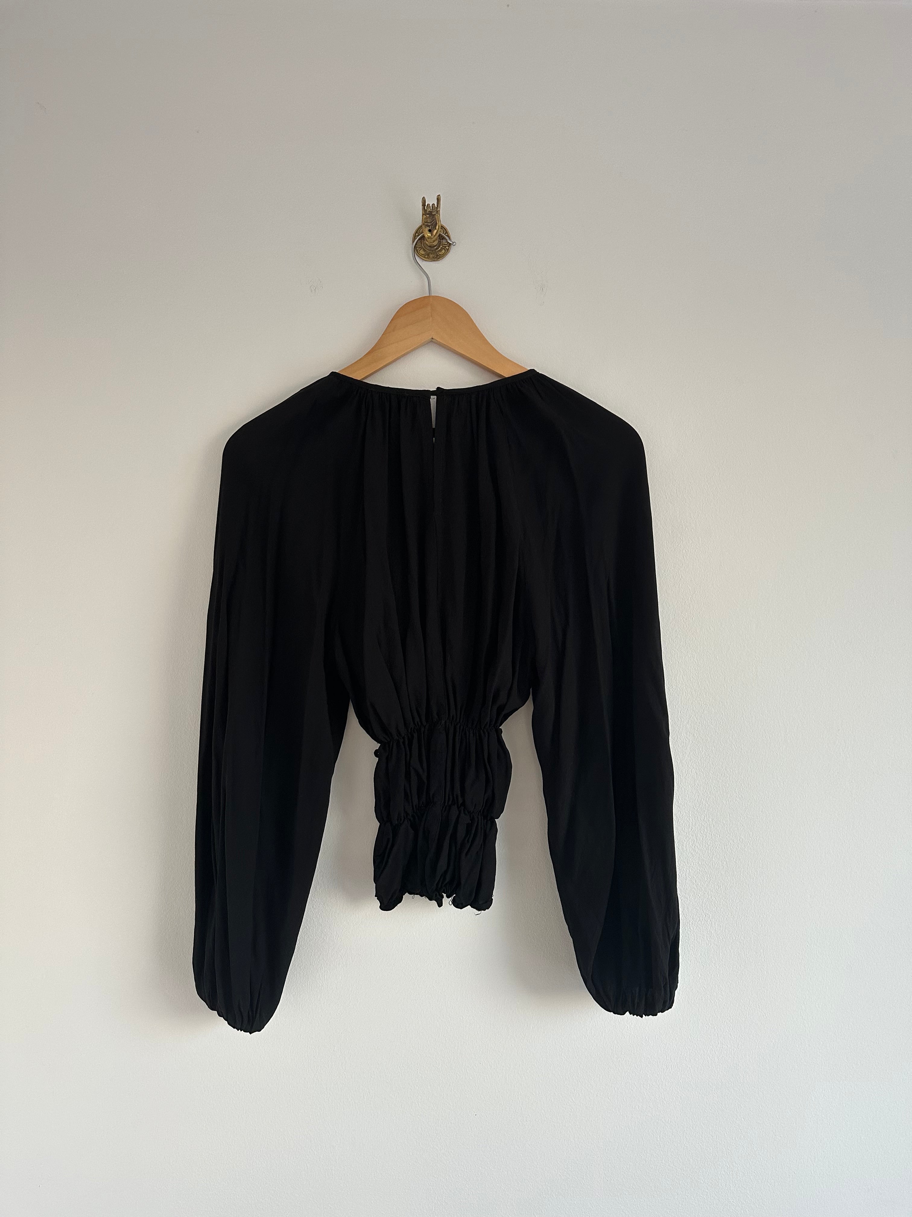 Zwarte blouse elastiek